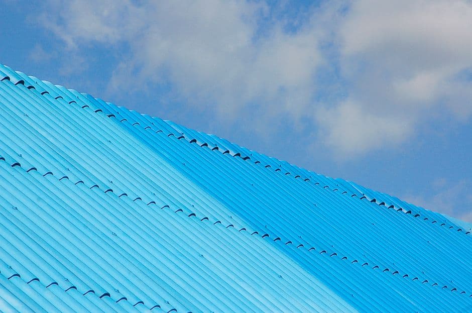 How Should GCs Level Commercial Roofing Bids When Membrane, Insulation, and Sheet Metal Scopes Are Priced Differently?